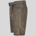 Brown leather shorts with belt and decorative elements on a light gray background