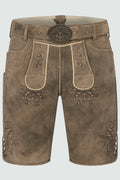 Brown leather shorts with decorative patterns on a light gray background