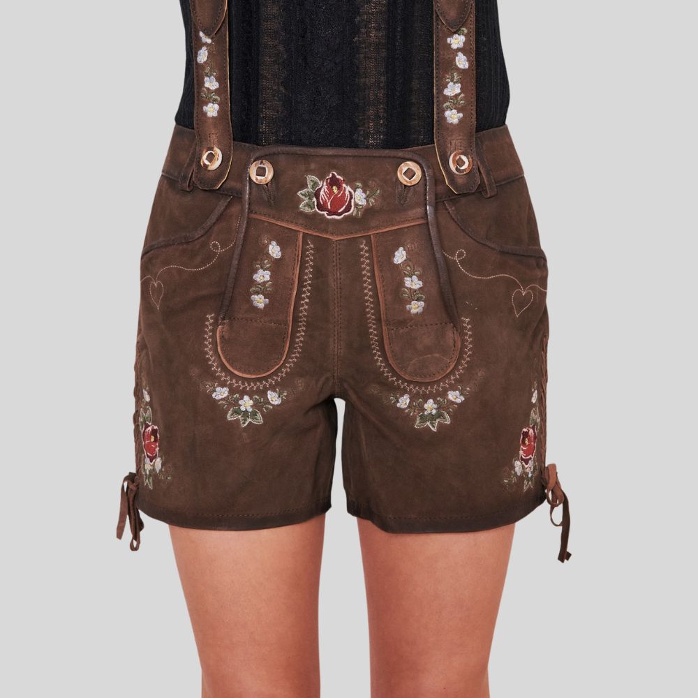 "Elegant dark brown leather lederhosen for women, featuring classic Alpine design with detailed embroidery and a tailored fit for a traditional yet stylish appearance."