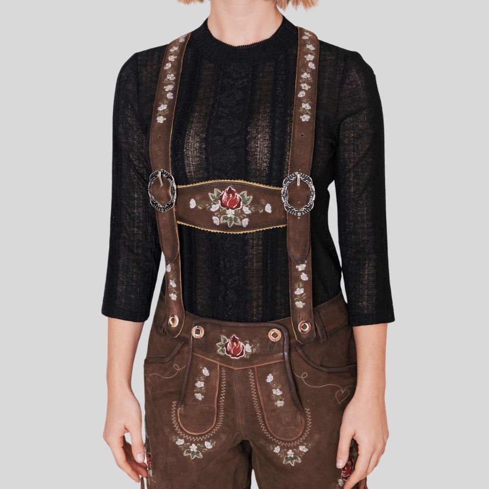 "Elegant dark brown leather lederhosen for women, featuring classic Alpine design with detailed embroidery and a tailored fit for a traditional yet stylish appearance."