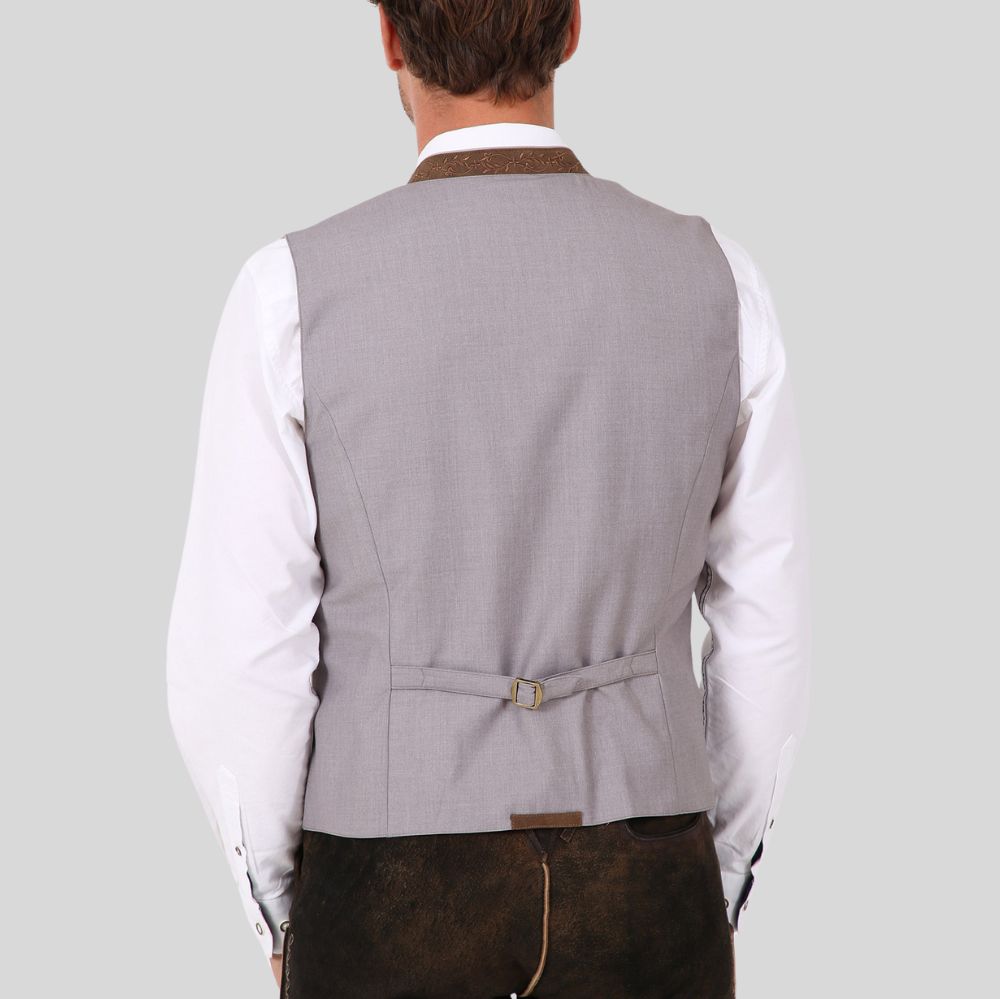 The Finishing Touch: Complete your wedding outfit with a polished men's waistcoat. 