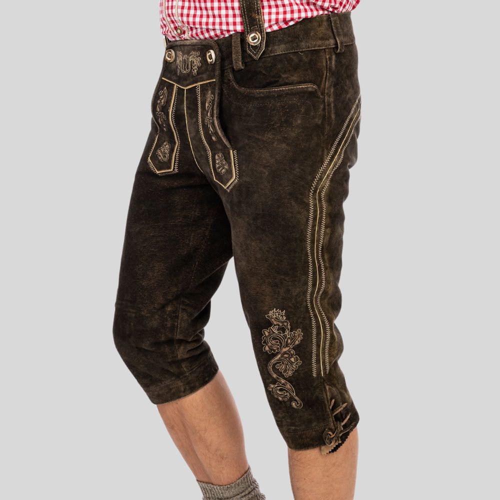 Own Your Vintage Vibe: Turn heads in a pair of retro men's Lederhosen - a unique twist on a classic look.