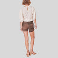 Soak Up the Sun in Style: Elevate your german look with a pair of trendy women's shorts.